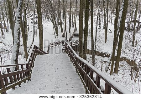 A Wooden Staircase Through A Ravine. Bitsa Park, Moscow, Russia. December.