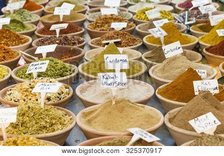 Piles Of Spices For Sale. Oriental Spices