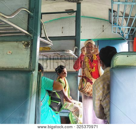 Kharagpur, West Bengal, India- August 23, 2019: Indian Folk Singer Performs In A Local Train.