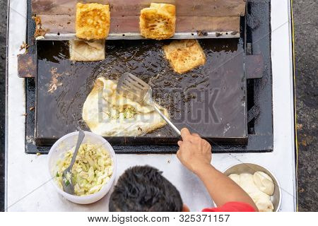 Top View Of A Man Hand Cooking Vegetables Martabak Jawa In Kota Kinabalu City Open Market In Sabah B