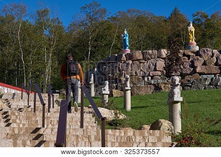Harrington, Qc, Canada - September 23, 2018: Tourists At The Tam Bao Son Buddhist Temple In Quebec D