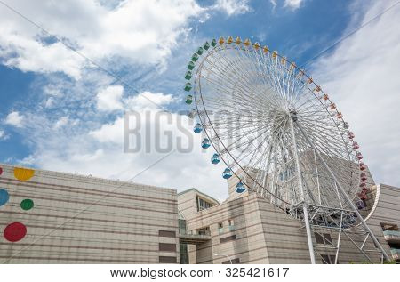 Taipei, Taiwan - Jun 8th, 2019: Ferris wheel and Miramar entertainment shopping mall in Dazhi, Taipei, Taiwan, Asia