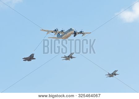Refueling Simulation From A Kc-130 Hercules During The Miramar Air Show