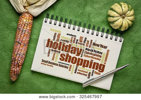 holiday shopping word cloud in a sketchbook with ornamental coran and gourd