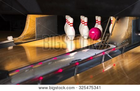 Close Up Of Alley At Bowling Club. Pin Bowling Alley Background. Closeup Of Ten Pin Row On A Lane, N