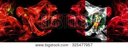 China Vs Peru, Peruan Smoke Flags Placed Side By Side. Thick Colored Silky Smoke Flags Of Chinese An