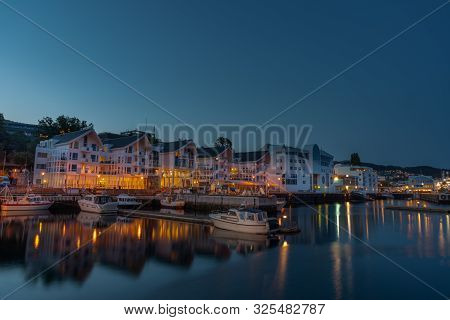 Molde, Norway - Aug 22, 2019: Night View In Architecture And Building Of The Norwegian City. Wooden 