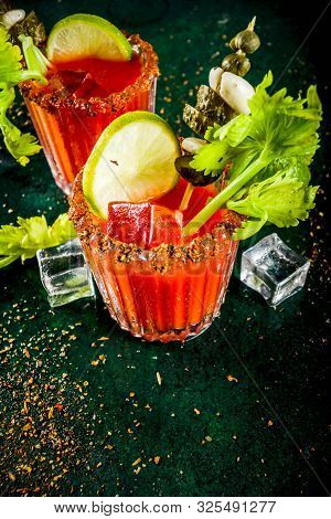 Spicy Bloody Mary Cocktail With Garnish . Homemade Texmex Styled Alcohol Drink,