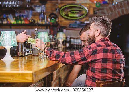 Men Relaxing At Bar. Friendship And Leisure. Friday Relaxation In Bar. Friends Relaxing In Pub. Orde