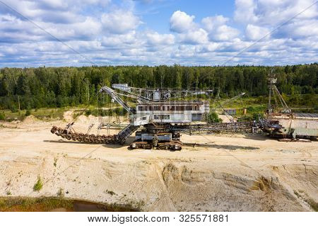 Old Rusty Multi Bucket Excavator, Giant Stacker, Absetzer In Sandy Career.