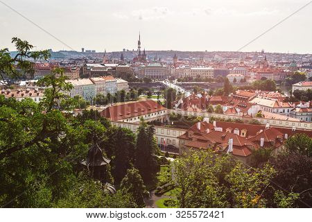 View On Prague Panorama With Red Roofs And Historic Architecture From Staromestska Radnice, Old Town