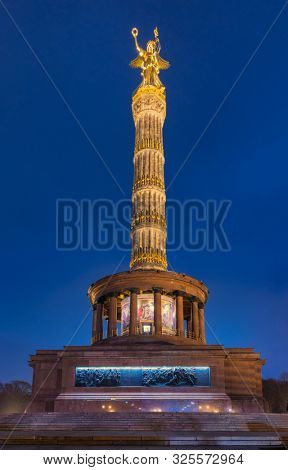 BERLIN, GERMANY - DECEMBER 15, 2018: Illuminated Berlin Victory Column (Siegessaule) monument, a major tourist attraction of Berlin at night