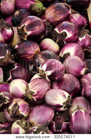 Fruits That Look Like Eggplant, Which Are Offered In The Market