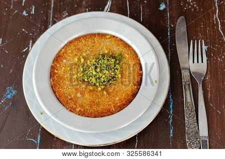 Delicious Traditional Turkish Dessert:  Kunefe  Kadayif With Pistachio And Cheese