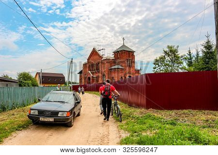 Trehsvyatskoe, Russia - May 2016: View Of The Russian Village, A Temple In Honor Of The Martyrs Guri