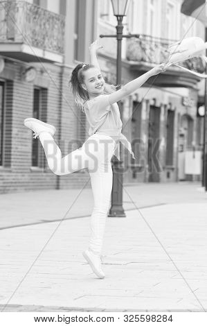 Born A Dancer. Little Female Dancer Performing Choreography On Street. Small Cute Girl Dancer Dancin