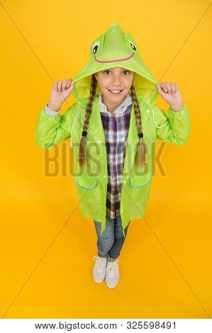 Rainproof Accessory. Waterproof Clothes Every Kid Should Try. Kid Girl Happy Wear Raincoat. Waterpro