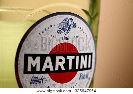 Kharkov, Ukraine - September 23, 2019: Bottle Of Vermouth Martini Rossi Close Up Logo On Beige Wall 