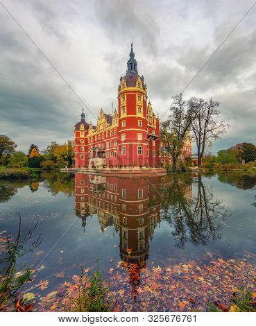 Scenic View Of Muskau Castle In Famous Muskau Park At Autumn Evening, Germany. Unesco World Heritage