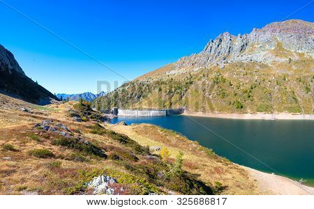 The Lake Colombo Dam With The Becco Lace In The Brembana Valley Orobie Alps