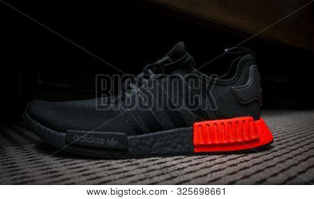 ADIDAS NMD sneakers with ULTRA BOOST technology in all black with red accent - sports shoes 
- Dubai