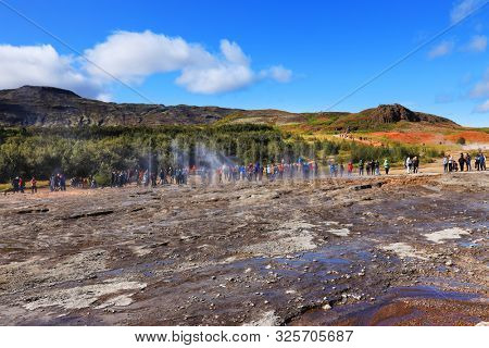 GEYSIR, ICELAND, 14 SEPTEMBER, 2019 : Tourists visiting the famous Geysir area in Iceland, Europe