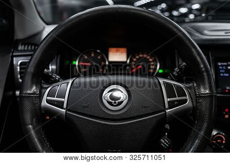 Novosibirsk, Russia - September 11, 2019:  Actyon Ssangyong, Black Luxury Car Interior - Dashboard, 