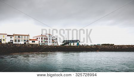 Entrance To The Port Of The Island Of Yeu With Its Semaphore And Typical Small Houses, France