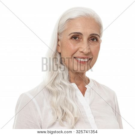 Portrait Of Beautiful Mature Woman On White Background