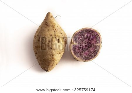 Okinawan Purple Sweet Potatoes On White Background