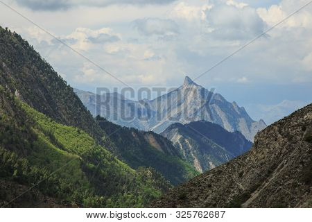 A Sharp Peak In The Mountains. Mountain Peak.
