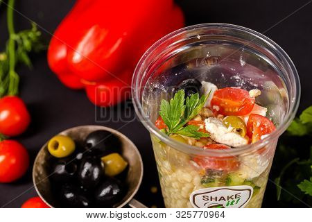 Russia St. Petersburg Greenbox 01102019 Italian Salad With Olives, Cereals, In A Plastic Container, 