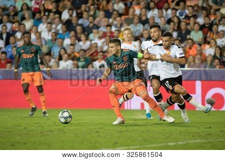 VALENCIA, SPAIN - OCTUBER 2: Tadic with ball during UEFA Champions League match between Valencia CF and AFC Ajax at Mestalla Stadium on Octuber 2, 2019 in Valencia, Spain