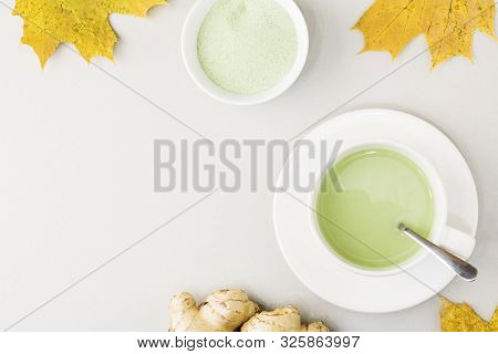Top View Of Green Tea Matcha In A White Mug. Matcha Ginger Latte. Concept - Healthy Autumn Drinks. C