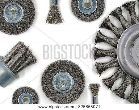 Top View Of Metal Brush For Angle Grinder And Other Brushes For Metalworking Isolated On White Backg