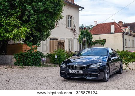 France Lyon 2019-06-18 Closeup Luxury Dark Blue German Car Sedan Premium Bmw 6 Series With Eu Regist