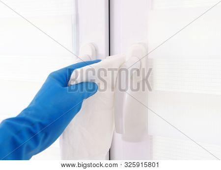 The Worker's Hand Wipes The Window. Maid Or Housewife Takes Care Of The House. Spring General Or Reg