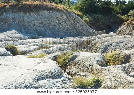 Muddy Volcanoes Paclele Mari Near Buzau, Romania. Mud And Natural-gas Eruptions Create Small Volcano