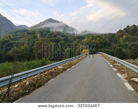 Road In The Mountains - Clouds Over Mountains - Cozia Mountains, Carphatians, Romania