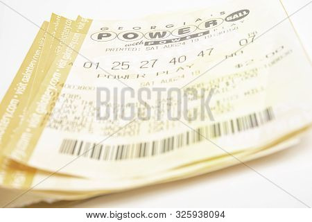 A Stack Of Powerball Lottery Tickets