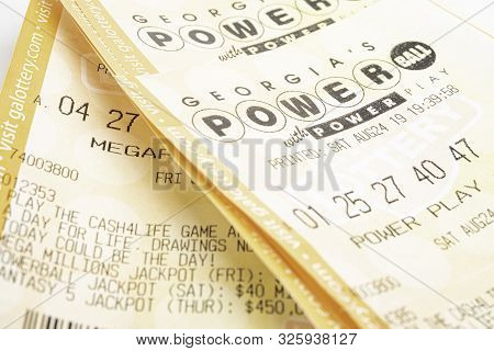 A Stack Of Powerball Lottery Tickets