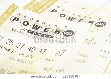 A Stack Of Powerball Lottery Tickets