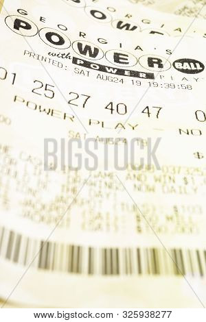 A Stack Of Powerball Lottery Tickets