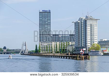 Berlin, Germany - April 22, 2018: River Spree With The High-rise At The Elsenbruecke Bridge, The Bui