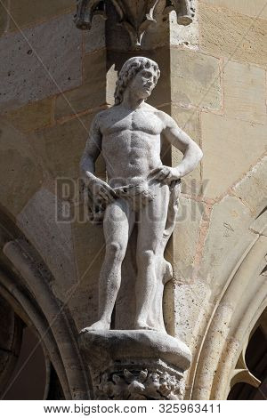 ROTHENBURG, GERMANY - JULY 16, 2019: Adam, statue on facade of the St James Church in Rothenburg ob der Tauber, Germany