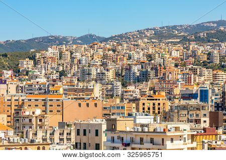 Mediterranean City Downtown With Lots Of Business And Residential Buildings In The Background, Biblo