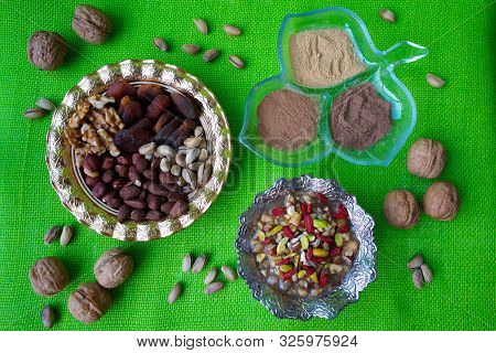 Preparation Of Ashura Dessert. Traditional  Turkish Dessert Noah Pudding, Ashura Or Asure On The Gre