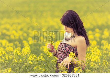 Happy Beautiful Woman In Free Summer Love Of Youth Wellbeing. Attractive Young Beauty Girl Enjoying 
