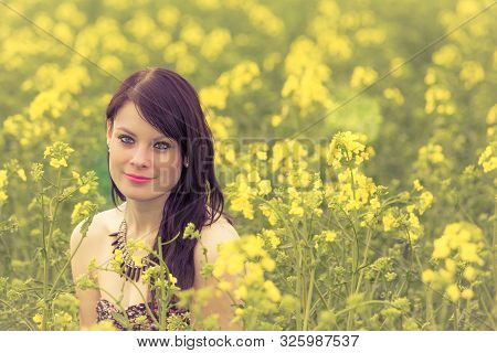 Happy beautiful woman in free summer love of youth wellbeing. Attractive young beauty girl enjoying 