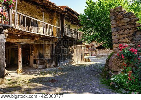 Narrow Alley In A Mountain Village With Old Rural Houses, Barcena Mayor.